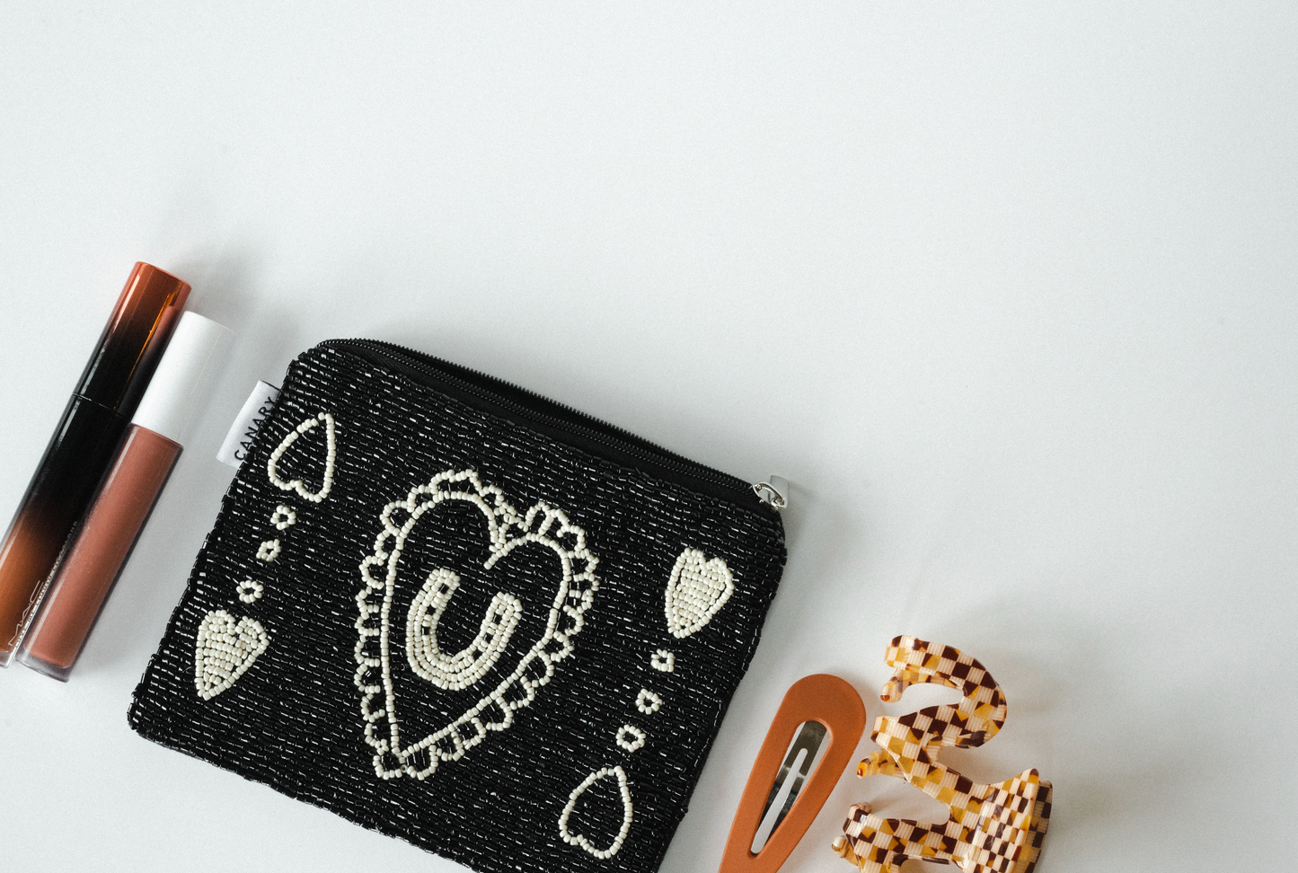 12. THE CANARY BEADED POUCH