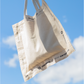 20. THE CANARY CARBON AIR INK TOTE BAG